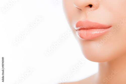 Cuadros en Lienzo Close-up woman's lips with natural make up on white background