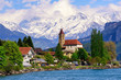 Brienz town near Interlaken and snow covered Alps mountains, Switzerland