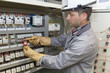 © Atelier 211 - electrician at work