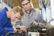© Atelier 211 - young apprentice with heating professional