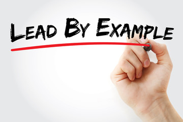 hand writing lead by example with marker, business concept