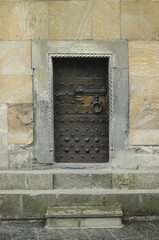 small door in ancient castle, iron door