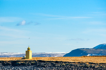 Canvas Print - Lighthouse in an icelandic landscape