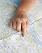 © Johnér - A hand pointing on a map, Sweden.