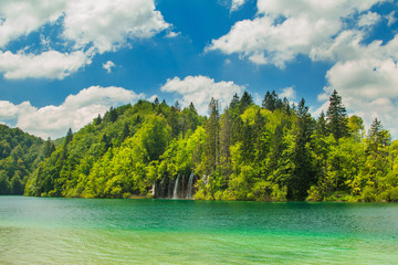     Beautiful landscape, waterfall and clear green water in the Plitvice Lakes National Park in Croatia 