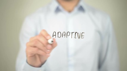 Adaptive Programming, man writing on transparent screen