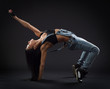 © papa - young beautiful dancer posing on a studio background