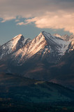 Fototapeta Góry - Cloudy Tatra mountains in the morning, covered with snow