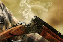 Hunting Rifle After Firing . Hunting In The Forest 