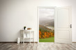 © Africa Studio - View to mountain landscape through open door