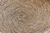 Fototapeta Desenie - Straw haystacks on an agricultural field