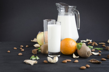 glass milk with nuts orange apple mint