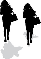 Vector silhouette of the walking girl with bag