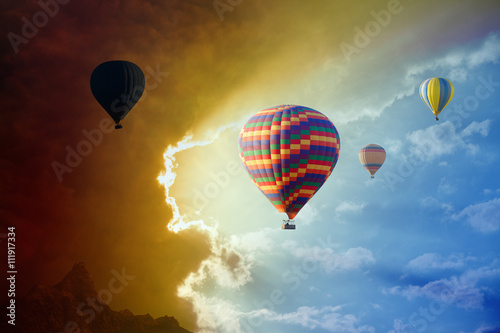 flying-hot-air-balloons-in-stormy-sky