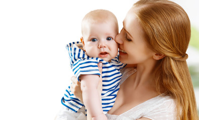 happy family mother playing with baby