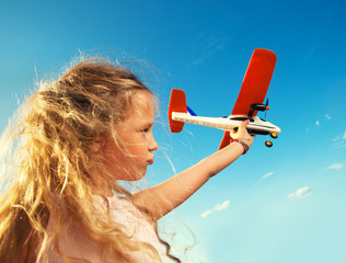 Poster - Girl playing with plane