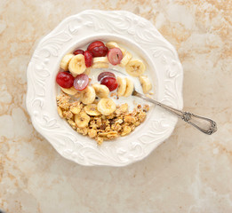 Wall Mural - Muesli with banana, grapes and milk. healthy Breakfast.