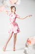 © julenochek - Beautiful elegant model posing in floral printed dress