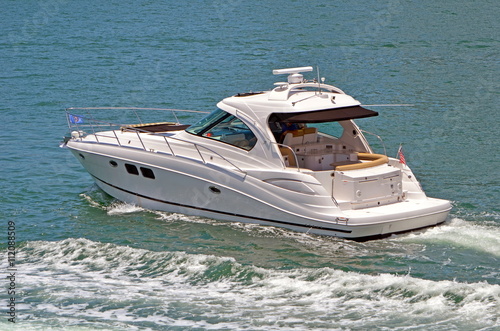 Small Motor Yacht Cruising The Florida Intra Coastal Waterway Near Small Motor Yacht Cruising The Florida Intra Coastal Waterway Near Miami Beach