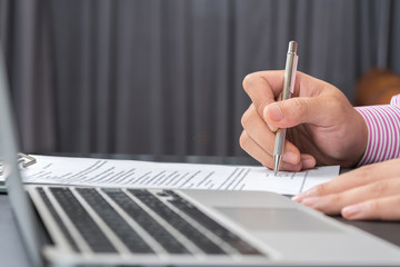 hand using laptop and write note inspire idea

