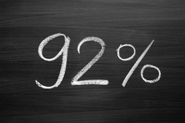 Wall Mural - 92 percent header written with a chalk on the blackboard