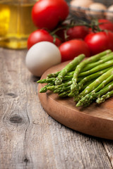 Wall Mural - fresh asparagus, tomatoes, eggs