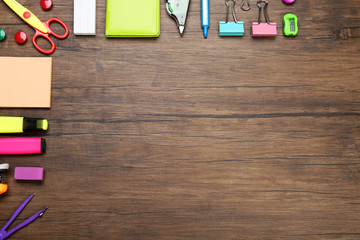 Sticker - Frame of stationery on wooden background