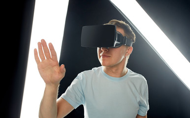 Wall Mural - happy man in virtual reality headset or 3d glasses