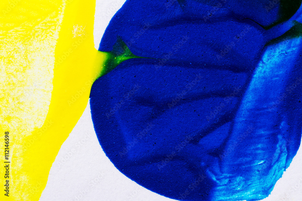 Closeup view of abstract hand painted blue and yellow acrylic art ...