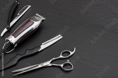 Fotografie, Obraz Barber shop tools on Black with place for text.