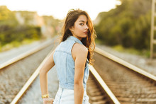 Portrait Of A Teenage Girl On Train Tracks