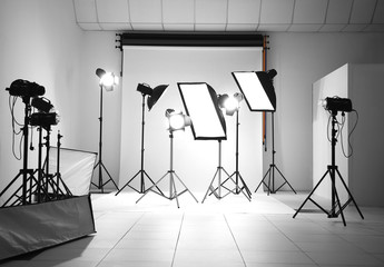 Sticker - Empty photo studio with lighting equipment