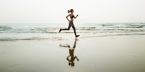 Wall Mural - Run Sea Sand Sport Sprint Relax Exercise Beach Concept