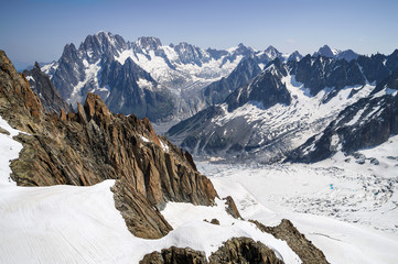 Wall Mural - Rocks and peaks of the mountains in summer season, close to the sky. French Alps, Mont Blanc massif, Chamonix.