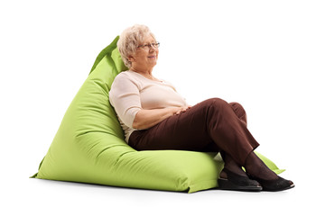 Poster - Relaxed lady sitting on a beanbag