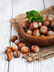 Wall Mural - Bowl with hazelnuts