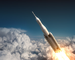 Wall Mural - space launch system flying in the clouds