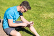 © soloveyigor - Sporty guy listening to music while training