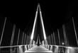 Pedestrian bridge at night. Graphical architectural structure