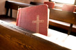 The old red books or red worship songbooks in church