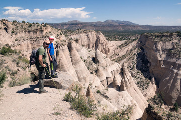 Family on top of the mountain. Kasha-Katuwe Tent Rocks  National Monument