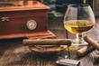 cigar and cognac with humidor in background