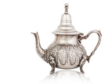 Silver Teapot Isolated On White With A Clipping Path.