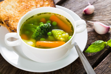 Canvas Print - Light soup of fresh vegetables