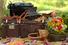 Romantic Autumn Still Life With Books, Plaid, Vintage Suitcase, Old Typewriter  And Leaves