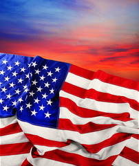 Wall Mural - Flag of United States of America on sunset background