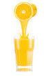 Pure orange juice pouring out from fruitin glass