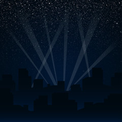 Wall Mural - silhouette of the city. rays of spotlights.