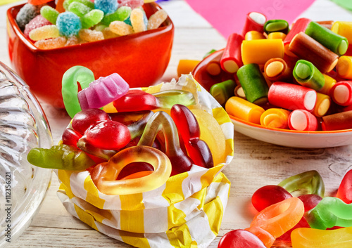 Obraz Dibond Close up view of gummy worms in stripped bag