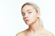 © DC Studio - Age protection. Young woman with drops of face cream on face